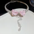 Elegant pink ribbon bow pearl necklace with rhinestone tassels and teardrop pearls for women - Pink