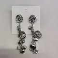 Orecchini pendenti vintage in argento con lunghe nappe di dischi metallici - Argento