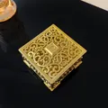 Close-up of ornate gold metal filigree jewelry box featuring exquisite palace style design - Square / Gold