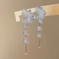 Elegant translucent glass flower petal long tassel earrings with silver needle posts - White
