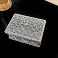 Detailed view of exquisite silver metal jewelry box with vintage hollow pattern design - Rectangle / Silver