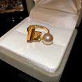 Vintage style adjustable open ring featuring a pearl and champagne zircons in gold finish - Champagne Zirconia Geometric Style (WR271) / Gold