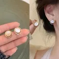 Elegant silver needle stud earrings with round cat's eye stone inlay - Gold & White Cat's Eye (Style 41)