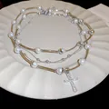 Elegant three-layer necklace with faux pearls and a shiny rhinestone cross pendant - Triple Layer Layered Cross (83#)
