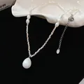 Elegant faux pearl teardrop pendant necklace featuring silver geometric square beads. - Teardrop Large Pearl Silver (90#)