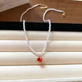 Vintage faux pearl necklace featuring a delicate red fruit pendant for elegant women - Pomegranate Rhinestone Pearl (97#)