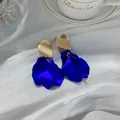 Elegant blue ruffled fan-shaped stud earrings featuring matte gold geometric tops for women - Blue Petal Style