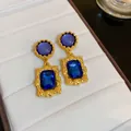Elegante goldene Vintage-Ohrhänger mit geometrischen kleinblauen Harzsteinen für Urlaub. - 41# Stil (Silber Ohrringpfosten) / Blau