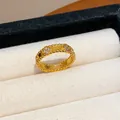 Close-up of gold-plated ring with zircon-encrusted flower motifs and beaded edges. - Four-Leaf Clover Bead Edge Style (WR517) / Gold