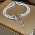 Elegant double-layer pearl necklace with a sparkling zircon butterfly pendant detail - Butterfly Tassel Double Layer Pearl Style (32#) / Silver