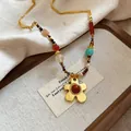 Vintage Maillard style tiger eye beaded necklace featuring a gold flower pendant - Gold Petal Agate Necklace