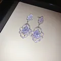 Elegant silver needle flower cluster earrings with sparkling zircons in luxury style - Zirconia Flower Cluster Studs