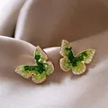Elegant butterfly stud earrings with green crystal inlay and gold plated finish. - 22# Gold-Green