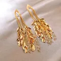 Elegant golden leaf tassel earrings with sparkling crystal beads in Bohemian style - 28# Gold