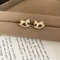 Exquisite 18k gold plated rocking horse stud earrings for a classic chic look. - 24# Bright Gold Rocking Horse Style (HE28716) / Gold