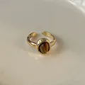 Close-up detail showing the natural grain of tiger's eye stone on a gold open ring - Vintage Tiger Eye Style (HR1464) / Adjustable Open / Ring - Coffee Color