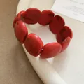 Bracciale retrò fatto a mano in acrilico marmorizzato rosso dal design unico e chic - Stile Perla Rotonda Marmorizzata (50#) / Rosso