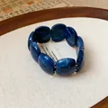 Bracciale elastico in acrilico marmorizzato blu vintage dal design artistico unico - Stile Perla Rotonda Marmorizzata (52#) / Blu