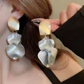 Elegant flower tassel earrings in gold and matte silver finish with silver needles - Silver Earring Post Style / Gold/Silver