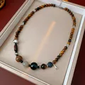 Natural tiger eye beaded necklace with mixed stone and wood accents in light luxury style - Necklace (59#) / Brown