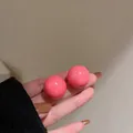 Elegant dopamine pink glossy ball stud earrings for a sweet summer fashion look - Sphere