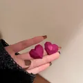 Fashionable dopamine pink heart-shaped stud earrings with a matte faceted finish - Heart