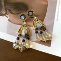 Detailed view of vintage palace style earrings with purple beads and crystals - Floral Court Style / Silver Earring Post - Gold - Purple