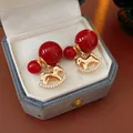 Elegant red pearl rocking horse earrings with S925 silver needles and zircons - Red Gold Double Pearl Horse (55#)