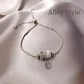 Élégant bracelet à breloques ajustable argenté avec perles de cristal et pendentif cœur - Type d'alliage / Argent Écologique