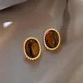 Eleganti orecchini ovali occhio di tigre con bordo vintage in corda dorata metallica - 79# Ago Argentato - Marrone - Ovale