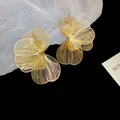 Elegant oversized golden filigree flower stud earrings with a modern Korean ins style. - Wire Cutout Flower Style (16#) / Large / Gold