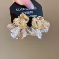 Korean style silver needle flower stud earrings with two-tone petal design and center gem - Gold And Silver Two-Tone Pleated Flower Style (41#) / Gold