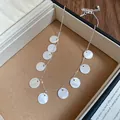Silver chain necklace with circular mother-of-pearl charms and small pearl detail - 20# Necklace-Silver-White