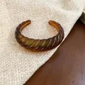 Amber brown resin cuff bracelet with twisted croissant design for a vintage look - 44# Bangle - Brown