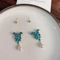 Elegant leaf-shaped earrings with vibrant blue crystals and a white teardrop pearl - 18# Silver Earring Post - Blue