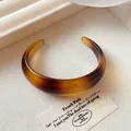 Elegant marbled amber resin cuff bangle featuring an open-ended geometric design - 47# Bangle - Style 1