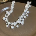 Elegant white pearl stitching necklace with woven band and pendant pearls, chic style - Spliced Ribbon Pearl Necklace / White