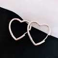 Elegant minimalist silver heart-shaped hoop earrings with a glossy finish for women - Large / Silver