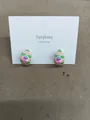 Unique striped egg-shaped stud earrings with colorful bead accents on white display card - Green-Pink-Purple