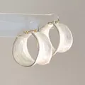 Elegant minimalist cream textured wide hoop earrings with gold-toned hardware on clear stand - 89# Earring - White