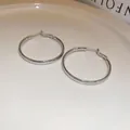 Elegant minimalist silver hoop earrings in a smooth metallic finish for stylish daily wear - Simple Polished Hoop Style (21#) / Silver