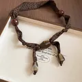Retro Maillard style leopard print silk scarf necklace with amber beads for women - Leopard Resin Beads
