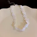 Elegant white lace flower choker necklace with adjustable chain for a delicate look - Ethereal White Hollow Floral Mesh Style