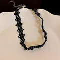 Detail view of a black lace floral choker necklace with delicate daisy patterns. - Sweet Black Hollow Floral Lace Style