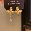 Vintage gold floral drop earrings with elegant pearls and clear teardrop crystal pendants - Teardrop Pearl Flower Style (20) / Gold