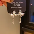 Elegant butterfly pearl drop earrings featuring S925 silver needles and rhinestones. - Butterfly Pearl Pendant Style (21) / Silver