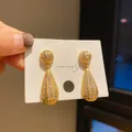 Elegant gold-plated waterdrop earrings with pavé set rhinestones for a vintage luxury look - Full Rhinestone Teardrop Style (22) / Gold