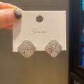 Sparkling diamond-set square stud earrings with silver bow knot detail on white card. - Rhombus Bow Style (25) / Silver