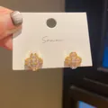 Elegant gold-toned clover earrings with clear zircon stones on a white display card. - Clover Full Rhinestone Style (31) / Gold