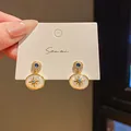 Elegant vintage gold oval drop earrings with star motif and blue crystal accents - Octagonal Star Shell Style (37) / Gold